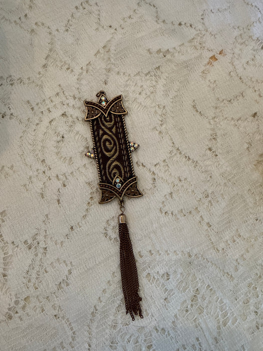 Metal banner charm with tassel