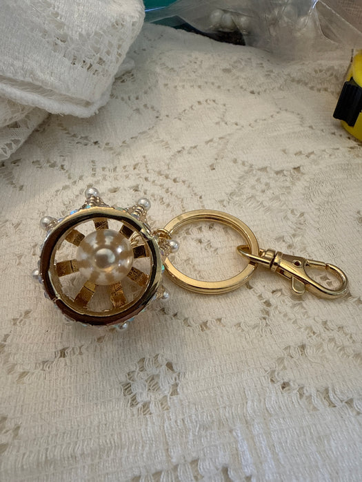 Gold tone crown keychain