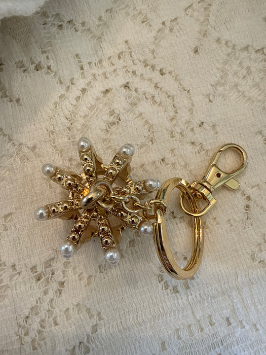 Gold tone crown keychain
