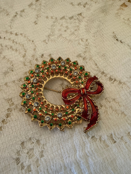 Holiday enamel pin wreath design